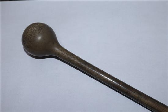 A South Asian rhinoceros horn gong beater